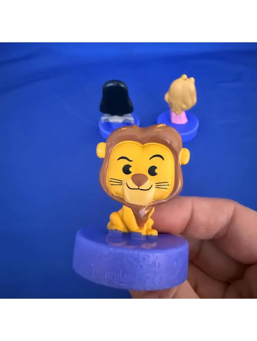 3 Figures McDonald's Happy Meals, celebrating Disneyland's 70th anniversary